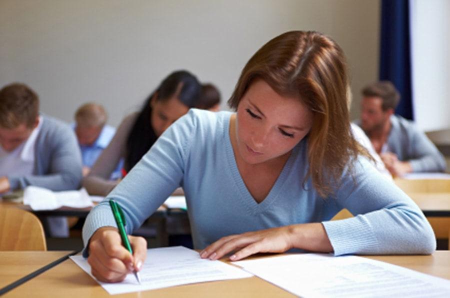 Woman studying for state exam.