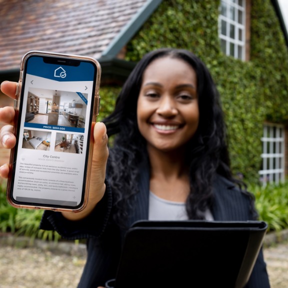 real estate agent showing online listing