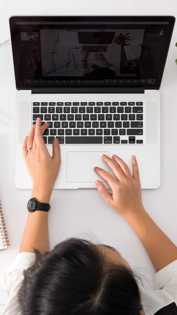 Woman with laptop.