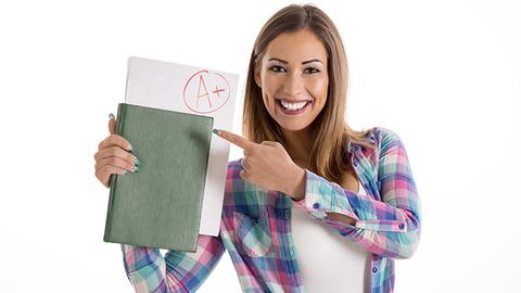 Girl holding test result.